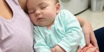 asleep at laundromat with my baby