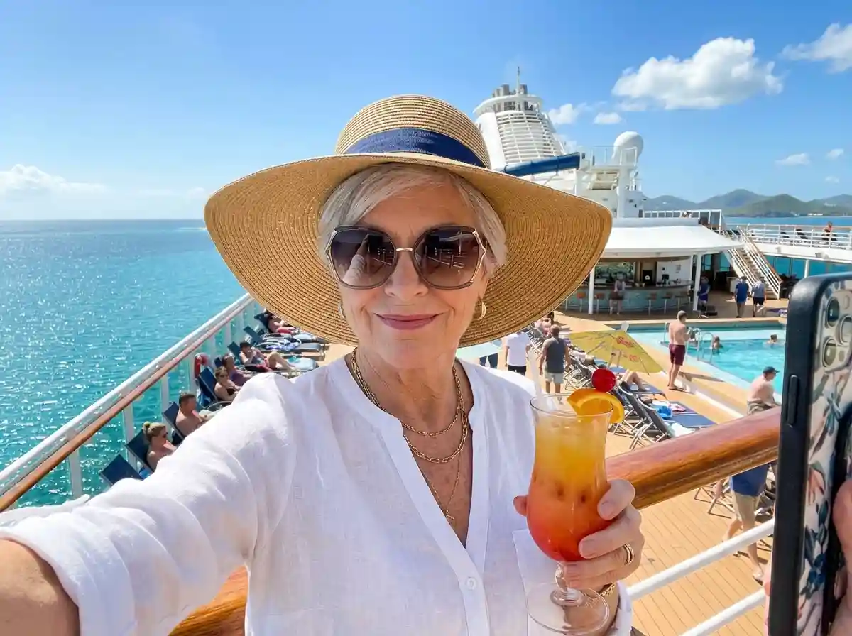 An arrogant older woman taking a selfie on a luxury Caribbean cruise ship